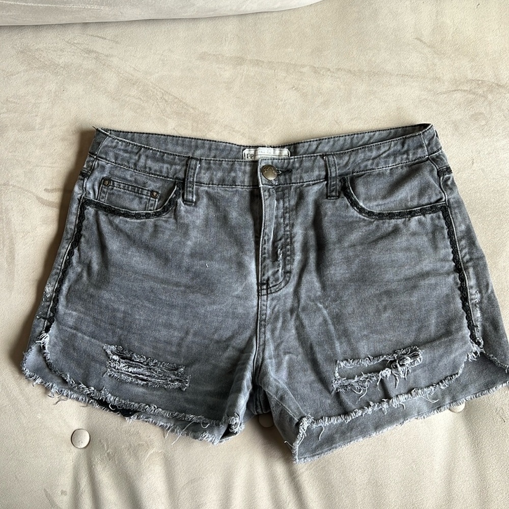Free people, distressed, jeans shorts, gunpowder gray. Size 31.